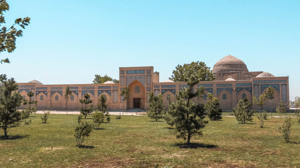 Amir Timur Museum from the outside. The blue detailing on the brick façade is visible. 